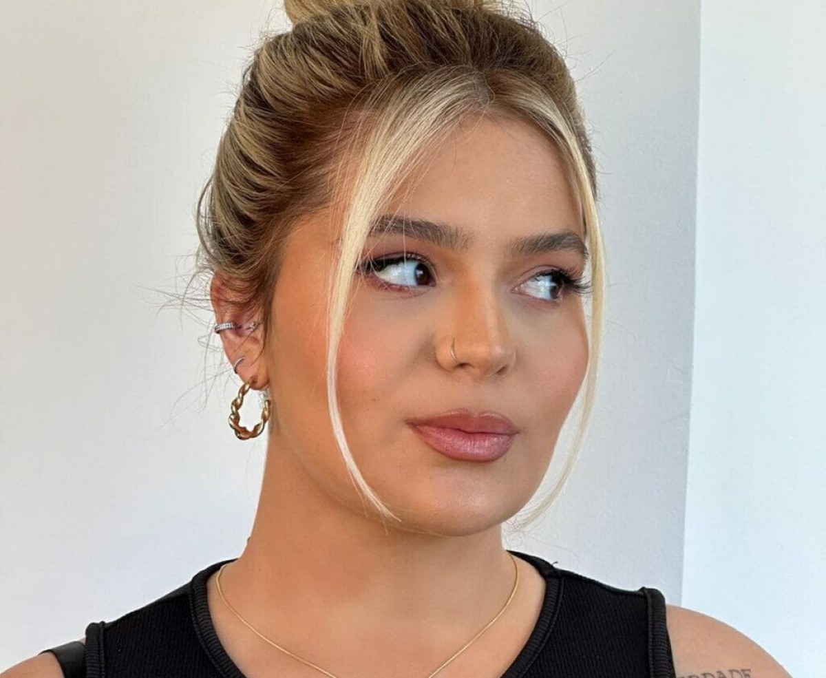 Ilustração em quadrado esverdeado do signo de Escorpião