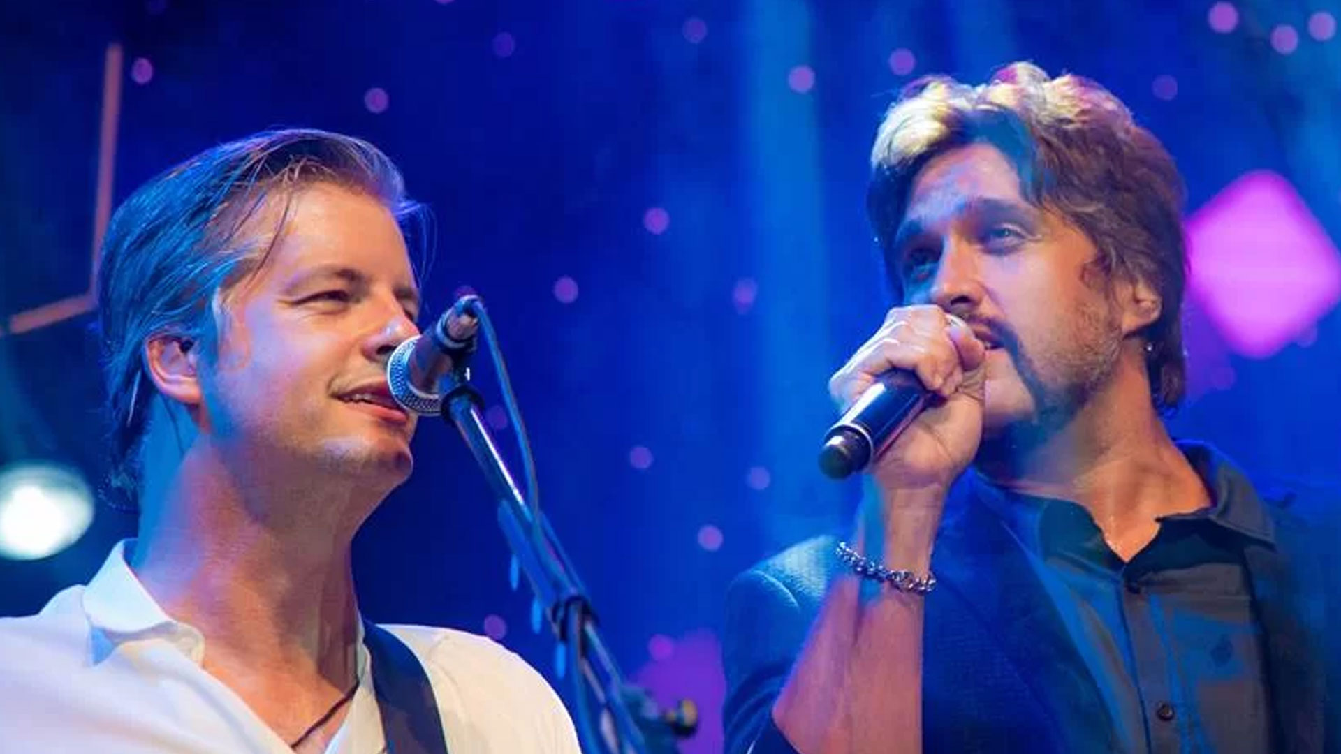 Cena animada da nova temporada, com Wee e Boom interagindo de forma divertida em um cenário colorido