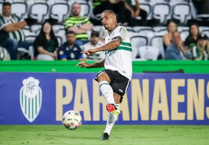 Ilustração do signo de Capricórnio, com símbolo branco em forma de N estilizado com cauda circular, centralizado em um fundo azul-escuro e adornado com círculos ao redor