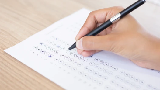 closeup-person-filling-out-questionary-form